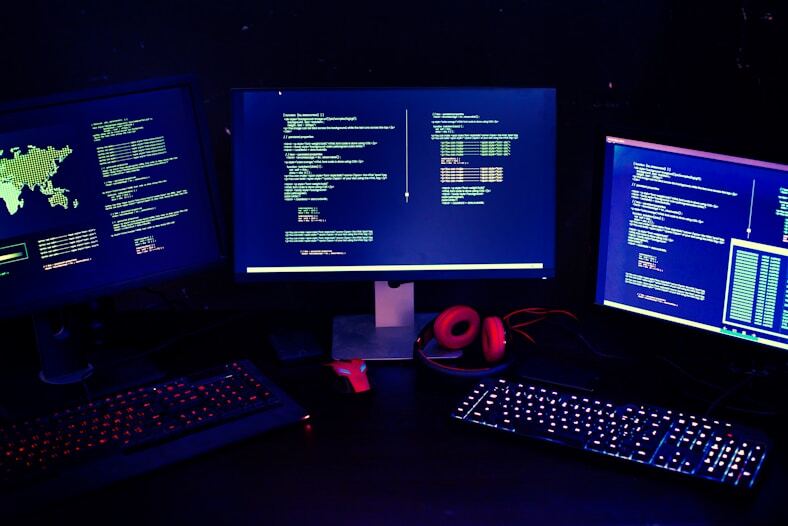 Computer screens showing code